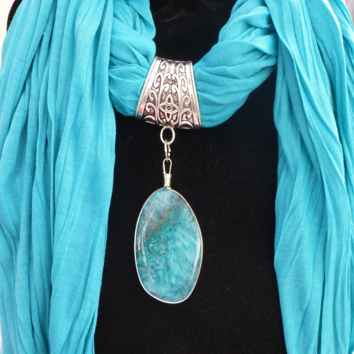 What are you wearing? (blue scarf or toboggan) phrase image
